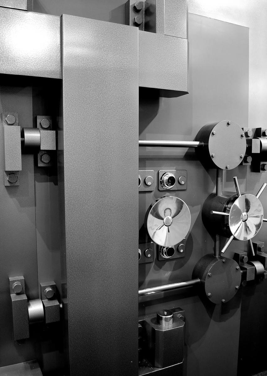 The open steel door of an old bank vault
